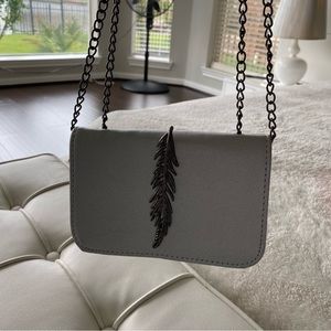 Metal feather silver purse